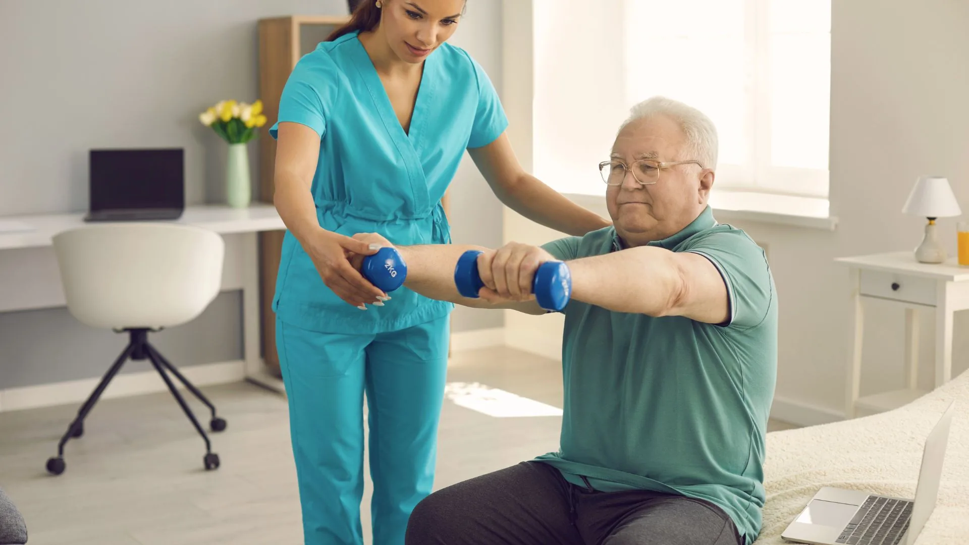 A physical therapist guiding an older adult through a light arm exercise in a home setting